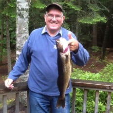 Fisherman with walleye catch