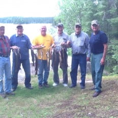 Happy group of fishermen