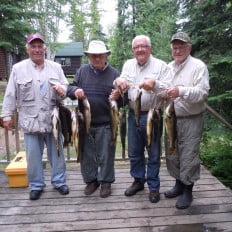Seniors with fish at the dock